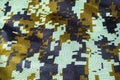 Dark green Camouflage khaki texture with pixels background. Army and military concept Royalty Free Stock Photo