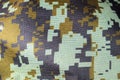 Dark green Camouflage khaki texture with pixels background. Army and military concept