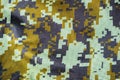 Dark green Camouflage khaki texture with pixels background. Army and military concept Royalty Free Stock Photo