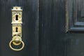 Dark green door with golden key hole Royalty Free Stock Photo