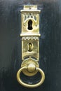 Dark green door with golden key hole Royalty Free Stock Photo