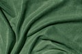 Dark green draped fabric with silver lurex thread Royalty Free Stock Photo