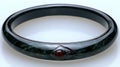 Dark green jade bangle with garnet, studio shot, white background, jewelry Royalty Free Stock Photo