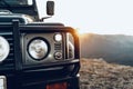 Dark green off-road car in the mountains Royalty Free Stock Photo