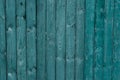 Dark green old wooden boards. Backgrounds and textures fence painted. Front view. Attract beautiful vintage background. Royalty Free Stock Photo