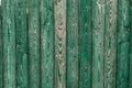 Dark green old wooden boards. Backgrounds and textures fence painted. Front view. Attract a beautiful vintage background Royalty Free Stock Photo