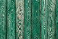 Dark green old wooden boards. Backgrounds and textures fence painted. Front view. Attract a beautiful vintage background Royalty Free Stock Photo