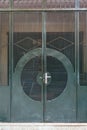 Dark green steel door with line and circle form in Hanoi, Vietnam Royalty Free Stock Photo