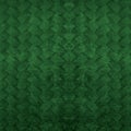 Dark green vintage retro geometric seamless grunge motif cement concrete tiles texture background with diamond shaped rhombus mesh Royalty Free Stock Photo