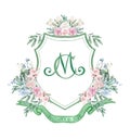 Dark green watercolor crest with pink, dusty blue flowers.