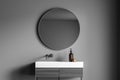 Dark grey bathroom wall with a stylish vanity Royalty Free Stock Photo
