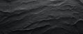 Dark grey black slate background or texture. Close up of black stone Royalty Free Stock Photo