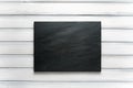 Dark grey and black stone slate background or texture on white wood background table. Royalty Free Stock Photo