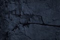 Dark grey blue. Crushed cracked rock texture. Like a old broken concrete wall. Close-up.