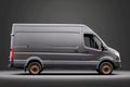 Dark grey cargo van. Isolated on grey studio background. Side view Royalty Free Stock Photo