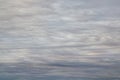 Dark, grey clouds covered the sky. Clouds in the form of lines and wavy layers. Royalty Free Stock Photo