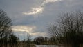 Rainclouds over a winter landscape in the flemish countryside Royalty Free Stock Photo