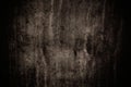 Dark grey concrete wall with imperfections and natural cement texture as scary background texture with dark vignetting Royalty Free Stock Photo