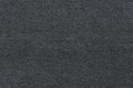 Dark grey fabric texture with soft surface. Royalty Free Stock Photo