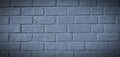 Dark grey or gray brick wall painted for background in vintage tone. Royalty Free Stock Photo