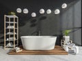 Dark grey hotel spa bathroom with seven pendant lights Royalty Free Stock Photo