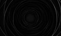 Dark grey and silver circles with shadow in the center on a black background. Royalty Free Stock Photo