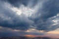 Dark, grey storm clouds above the sea. Royalty Free Stock Photo