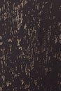 Dark grey textured wall with light grey stains underneath. Grunge background wallpaper Royalty Free Stock Photo
