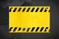 Dark grungy background and yellow warning banner with copy space Royalty Free Stock Photo