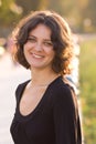 Dark hair girl in black dress Royalty Free Stock Photo