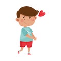 Dark Haired Emoji Boy in Red Shorts Falling in Love Vector Illustration