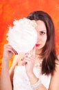 Dark-haired girl in a wedding corset on an abstract background Royalty Free Stock Photo