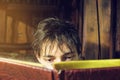 Dark haired man reading book being focused Royalty Free Stock Photo