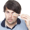 Dark-haired man with sushi Royalty Free Stock Photo