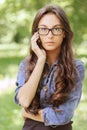 Dark-haired young woman talking by Royalty Free Stock Photo