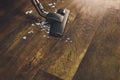 Dark head of a modern vacuum cleaner being used while vacuuming a rug. Cleaning service concept. Process carpet with Royalty Free Stock Photo