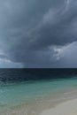 Dark hurricane cloud above tropical sea Royalty Free Stock Photo
