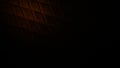 Dark industrial grid texture with deep black tones and subtle orange highlights, creating a grainy, dramatic backdrop for modern Royalty Free Stock Photo
