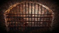 A dark jail cell with bars on the wall Royalty Free Stock Photo