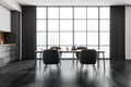 Dark kitchen room interior with four armchair and table