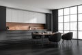 Dark kitchen room interior with four armchair and table