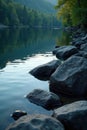 Dark lake rocks, subtle water ripples, peaceful scene , peace, shadows Royalty Free Stock Photo