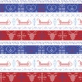 Dark and light blue, and red Nordic Christmas seamless pattern with santas sleigh, reindeer, snowflakes, stars decorative ornament Royalty Free Stock Photo