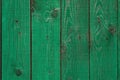 Dark lime vintage wooden boards. Backgrounds and textures fence painted. Front view. Attract a beautiful vintage Royalty Free Stock Photo