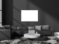 Dark living room interior with sofa and coffee table, mockup poster Royalty Free Stock Photo