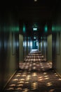 Dark corridor with light at the end inside a building Royalty Free Stock Photo
