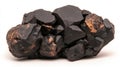 Dark lumps of coal fuel isolated on white background, closeup study of texture and energy potential Royalty Free Stock Photo