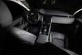 Dark luxury car Interior. Front seats of premium suv Leather panels. the view from the ceiling Royalty Free Stock Photo