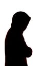 Dark male silhouette in casual sportswear with a hood, figure of a guy hiding his face, concept of privacy and confidentiality