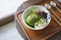 Dark Matcha ice cream with topping. Royalty Free Stock Photo